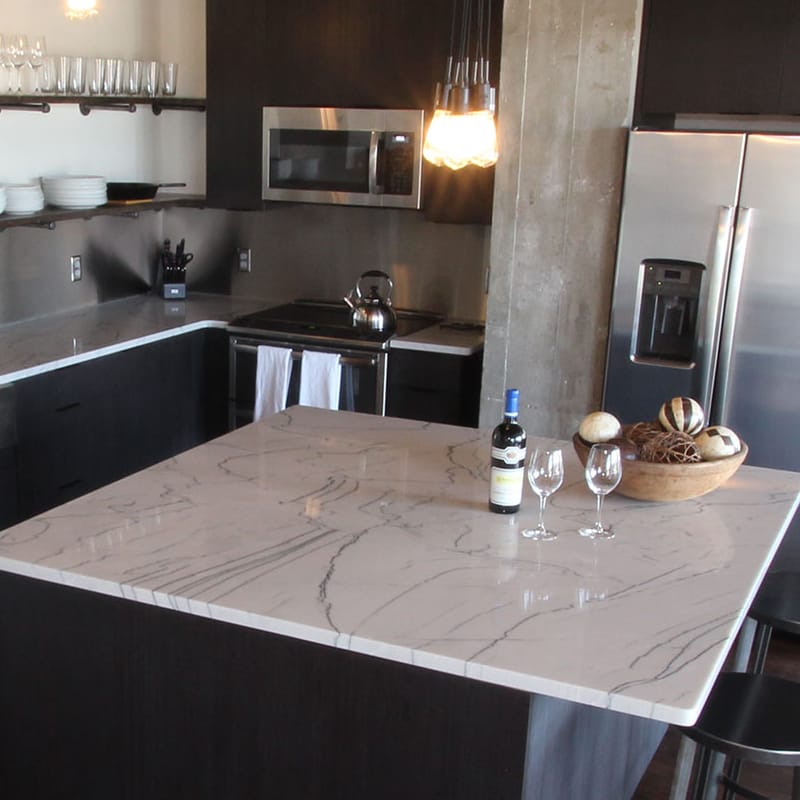 Tops Unlimited Kitchen island with Ggranite countertop